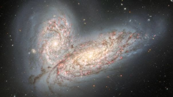 Dos galaxias est�n a punto de fusionarse en uno de los eventos m�s espectaculares del universo